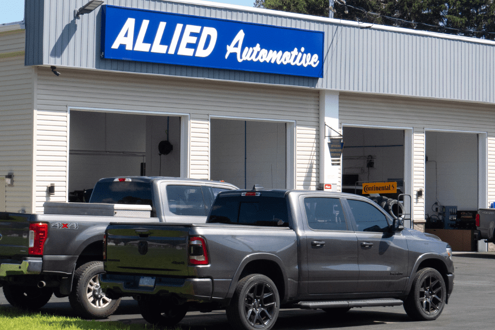 Auto repair shop in Allentown, PA by Allied Automotive. Image of two trucks parked in front of the shop, showcasing the clean, professional exterior and the welcoming atmosphere of the auto repair service.