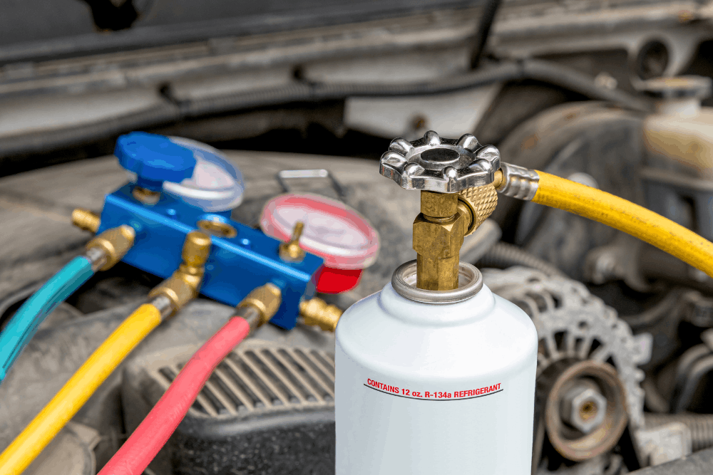 Car a/c repair, auto repair in Allentown, PA by Allied Automotive. Image of A/C service gauges and refrigerant lines connected to a vehicle, highlighting accurate diagnostics, proper refrigerant levels, and reliable cooling performance for year-round comfort.